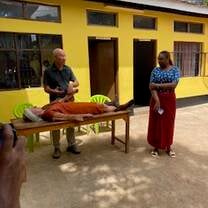 Helping the volunteer doctor to translate to the students