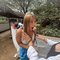 Freaking out and crying as I had a snake put around my neck 