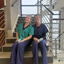 My friend and I getting ready to sit in an operating room and observe a spinal fusion up close!