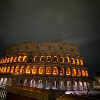 Beautiful picture of the Colosseum at night 