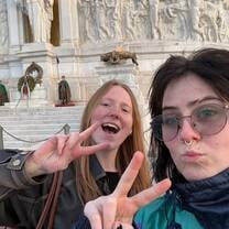 My bestie and I posing in front of the soldiers in Rome Italy