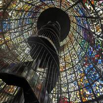 Spiral staircase surrounded by gorgeous art