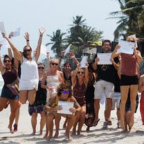 myTEFL interns jumping for joy.