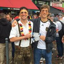 Male interns posing in lederhosen in Germany!