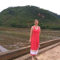 Volunteer in the front of rice paddy