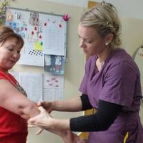 Projects Abroad medical volunteer in therapy with patient in Mongolia