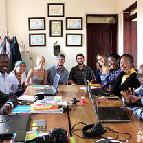 Crew meeting with their changemaker in Kampala, Uganda. 
