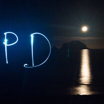 Lightpainting fun with our headlamps as a full moon rose over the water at Mimiwhangata Coastal Park, NZ.