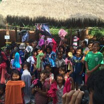 KidTea volunteering. Amazing kids who love to learn getting new clothes!