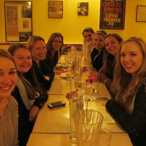 Students & Professor Sarah at a discussion dinner for career advice.