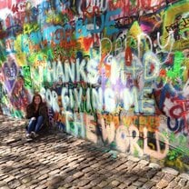 Me in front of the John Lennon Wall.