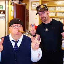 Meeting in a Stamp Shop