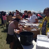 Serving meals as part of North American Indian Days.