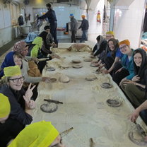 Making Chapati for worshippers at a temple in Delhi.