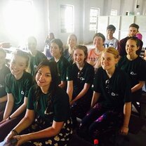 Group picture of the GVI crew at an assembly at a school where we volunteered weekly.