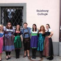 Students wearing Lederhosen and Dirndln in front of Salzburg College