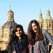 Two program participants pose in Oviedo.