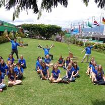 students playing in grassy field