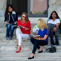 IBS Students sitting on stairs 