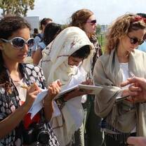 Arava students taking notes