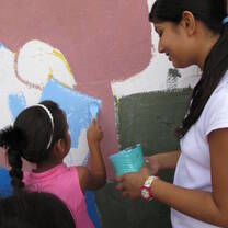 Painting a mural in Argentina.