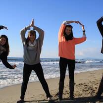 students spelling CAPA on beach