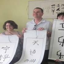 Konall Culture Exchange students practicing calligraphy