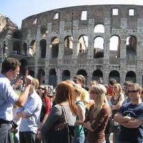 Students in front of Roman Coliseum in Rome