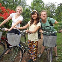 three girls with bikes