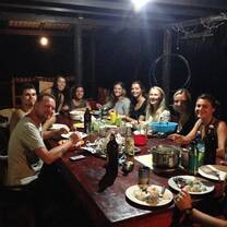 Spanish students enjoying their family-style dinner.