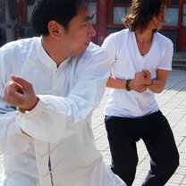 Academic Explorers student with Zhang Shifu