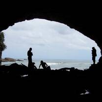 students on beach in new zealand