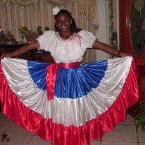 An ICADS student tries on a "typical dress" in celebration of Costa Rica's Independence Day on Sep. 15th.  ICADS Spanish students celebrate Costa Rica's Independence Day on September 15th