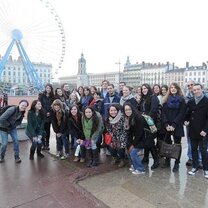 Orientation includes a city tour. Here the group is at Place Bellecour