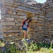 Student Posing on Ruins in Delos