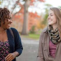 Two people laughing