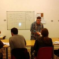 teacher and students in an english classroom