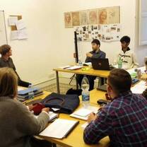 teaching english class with students and teachers