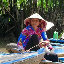 Cultural excursions are an added benefit to the TravelBud program Vietnamese woman in Mekong Delta