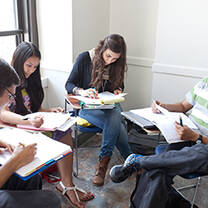 Students in class at Teaching House