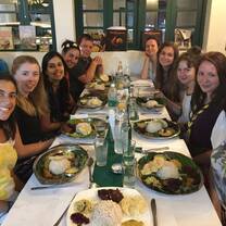 Volunteers have a meal together