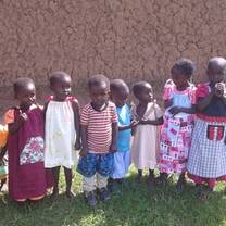 Jabez Vulnerable Children happy in their new dresses