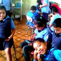 Children using technology in classroom