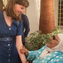 A volunteer with a local woman