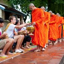 students meeting monks