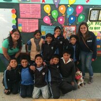 Volunteers with a primary class Volunteers with a primary class