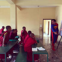 Our Super Volunteer teaching English to young monks in a Buddhist Monastery