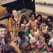 Volunteers with kids of Center