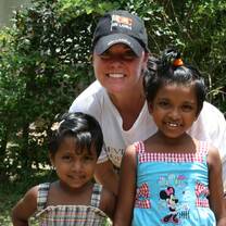 A volunteer with two Sri Lankan girls