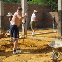 Volunteers and locals working on the trades training facility